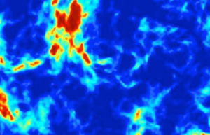 Un modèle d'ondes radio dans le ciel créé par la combinaison du rayonnement des premières étoiles et de l'effet de la matière noire. Les zones bleues sont celles où la matière noire a refroidi la matière habituelle (Credit : Pr Rennan Barkana)